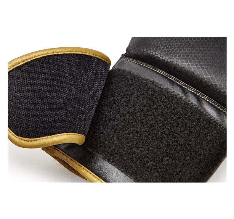 VAREJO 10OZ LUVAS DE BOXE REEBOK GOLD-PRETO 10OZ