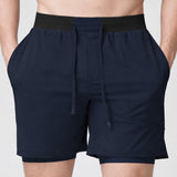 MOTION 2 IN 1 SHORT FORWARD CINZA ESCURO COM COLAN -  MASCULINO - S